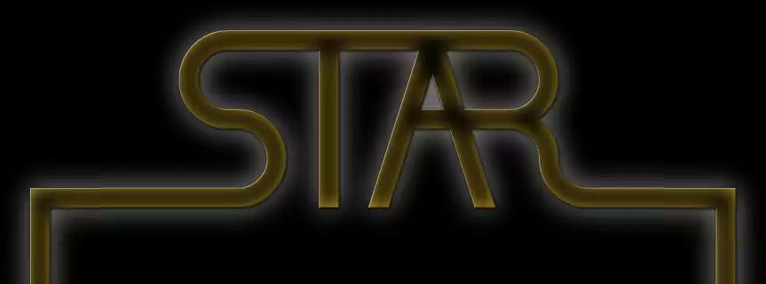 A heading has the STAR logo made out of brass.  The lines on the end bend at right angles to form a box around the main content.