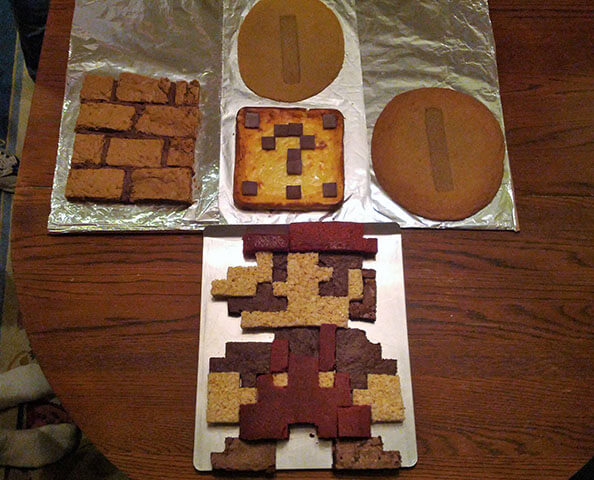 The assembled scene, with Mario under a question mark block, brick block, and coins..