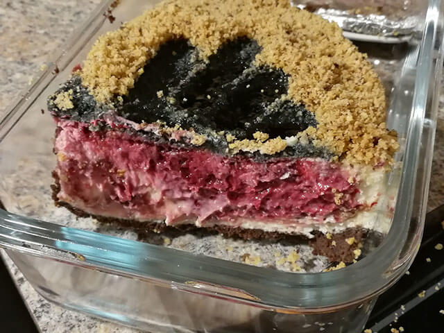 A slice with the raspberry flesh layer visible.