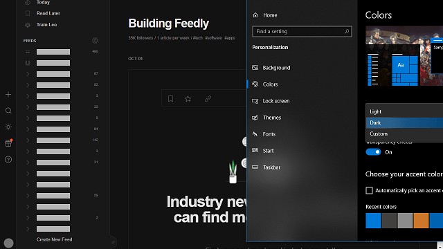 A screenshot of Feedly and Windows in dark theme.