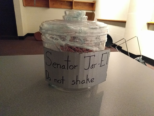 Senator Jar-El is a brain in a jar.  A sign on the jar says, Senator Jar-El, Do not shake.